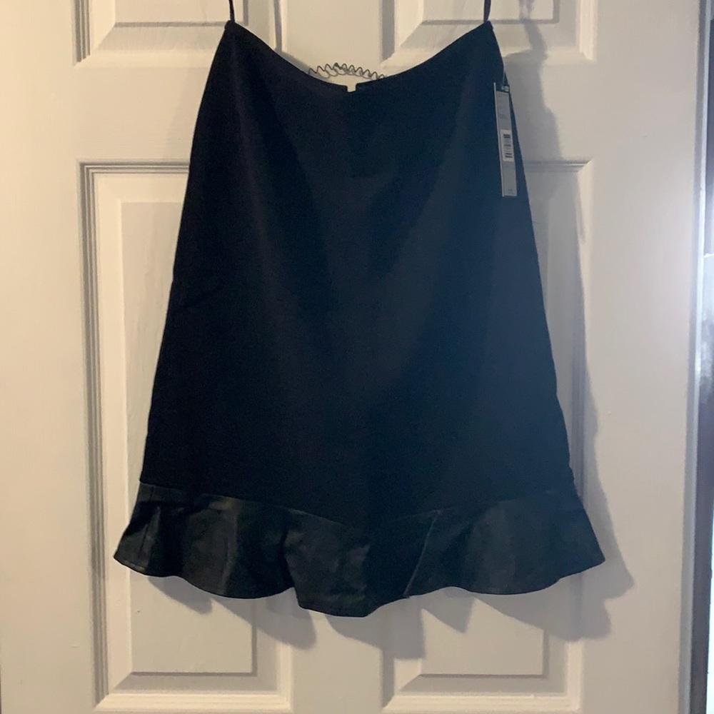 Black skirt with leather trim